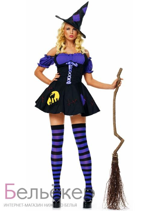 Костюм Ночная ведьмочка Сочетание черного с фиолетовым смотрится очень эффектно. Этот костюм ведьмочки с открытыми плечами и пышной юбочкой подчеркнет фигуру, сделает ее сексуально привлекательной, а остроконечная шляпка дополнит образ.